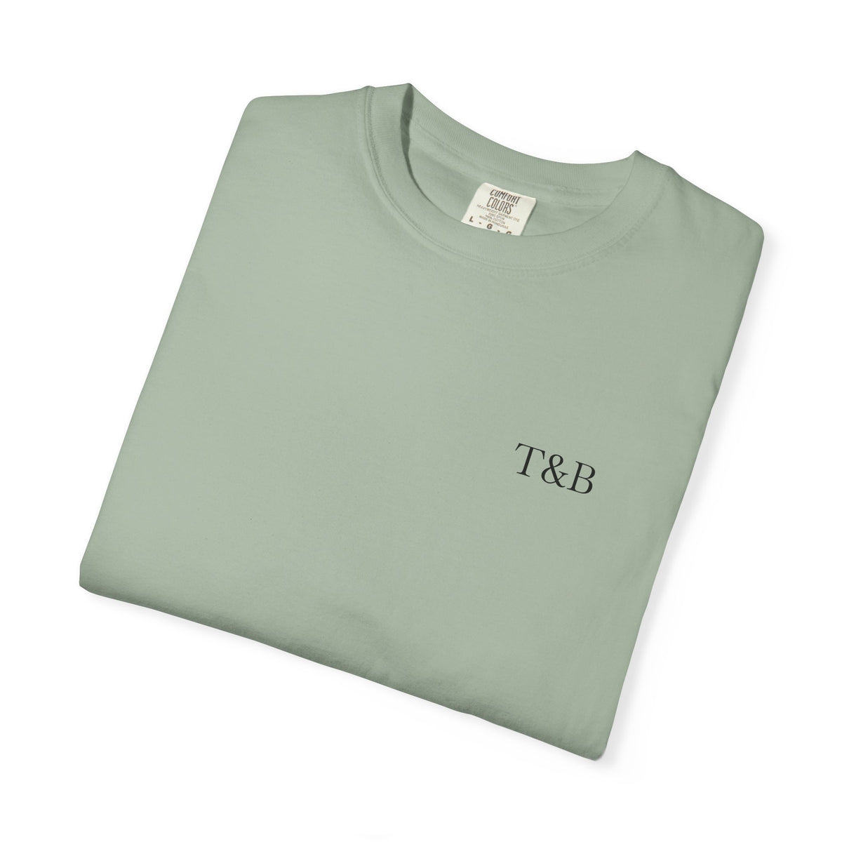 Folded gray t-shirt with a small logo on a white background
