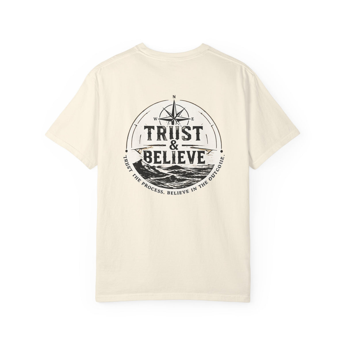 Beige t-shirt with 'Trust & Believe' graphic on a white background