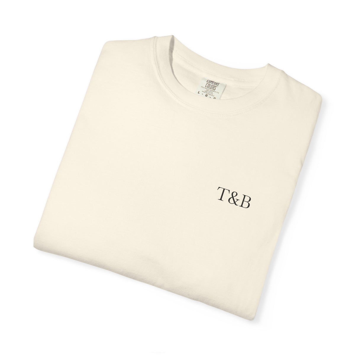 Folded cream-colored sweatshirt with 'T&B' monogram on a white background